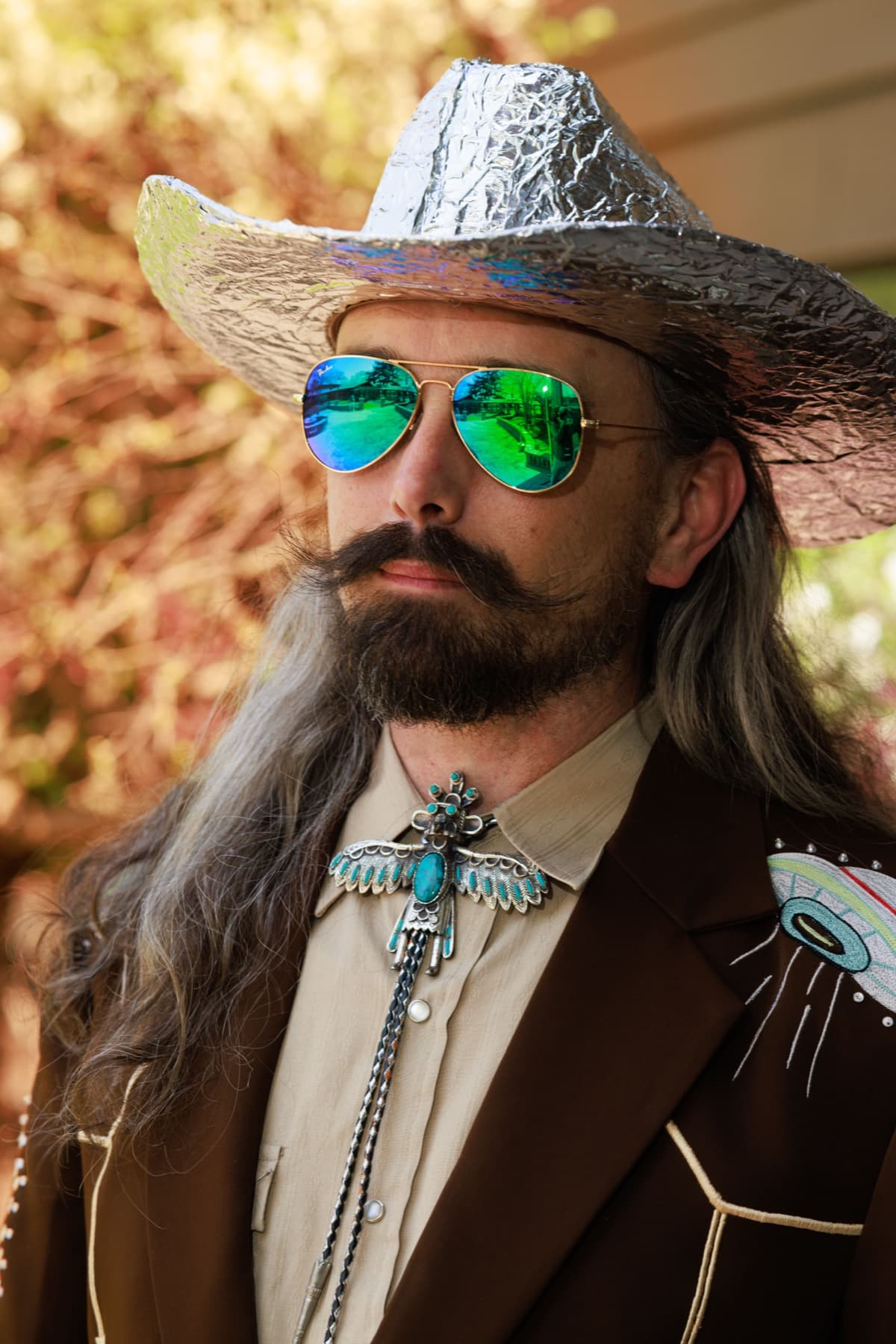 Zach Skrede in his foil hat and hand-beaded jacket
